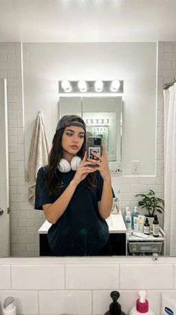 Petra - EMBROIDERED TEXTURED BLOUSE + 50TH ANNIVERSARY LEATHER TROUSERS WITH DARTS AND BELT - Bathroom Mirror Selfie